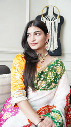 Saree with Orange Blouse